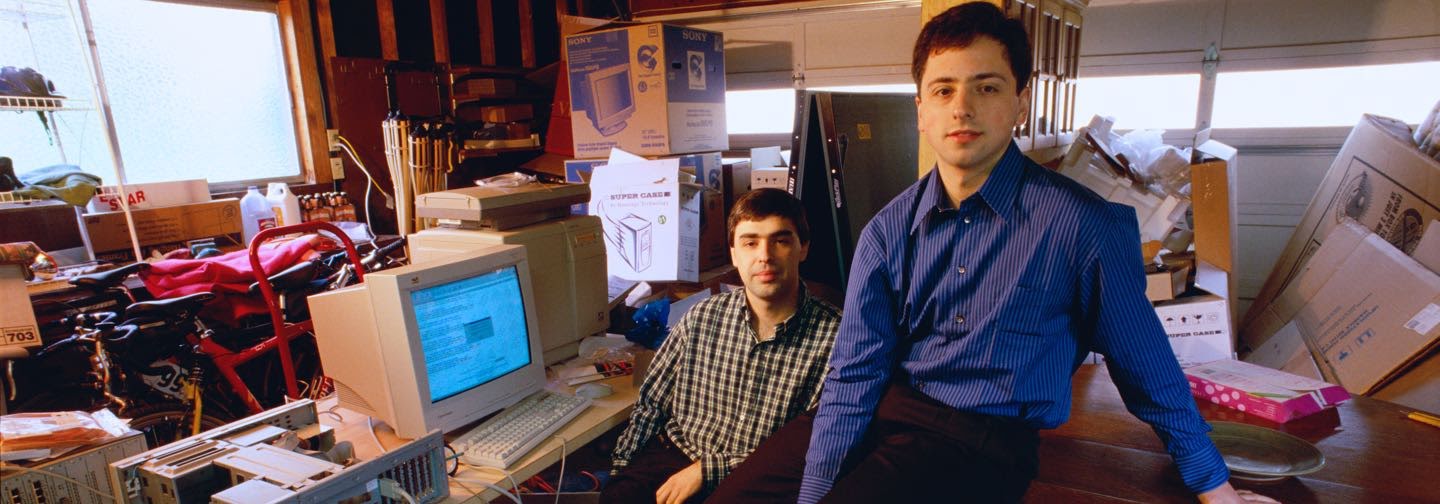 Larry and Sergey in the garage they used as a makeshift office (1998)